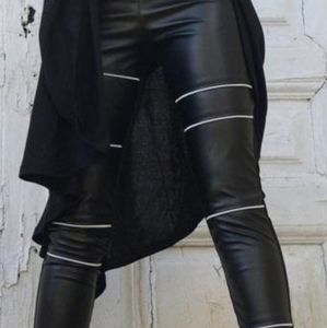 Leather tight pants with zipper details